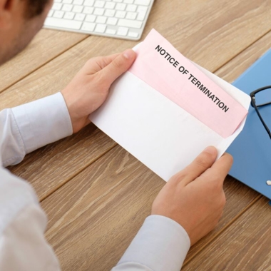 person holding envelope