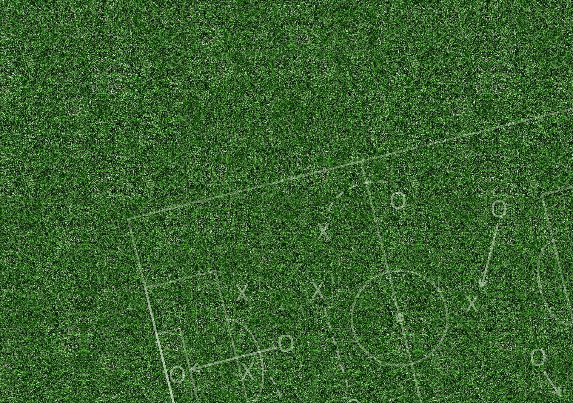 Green Turf with Outline of Football Plays