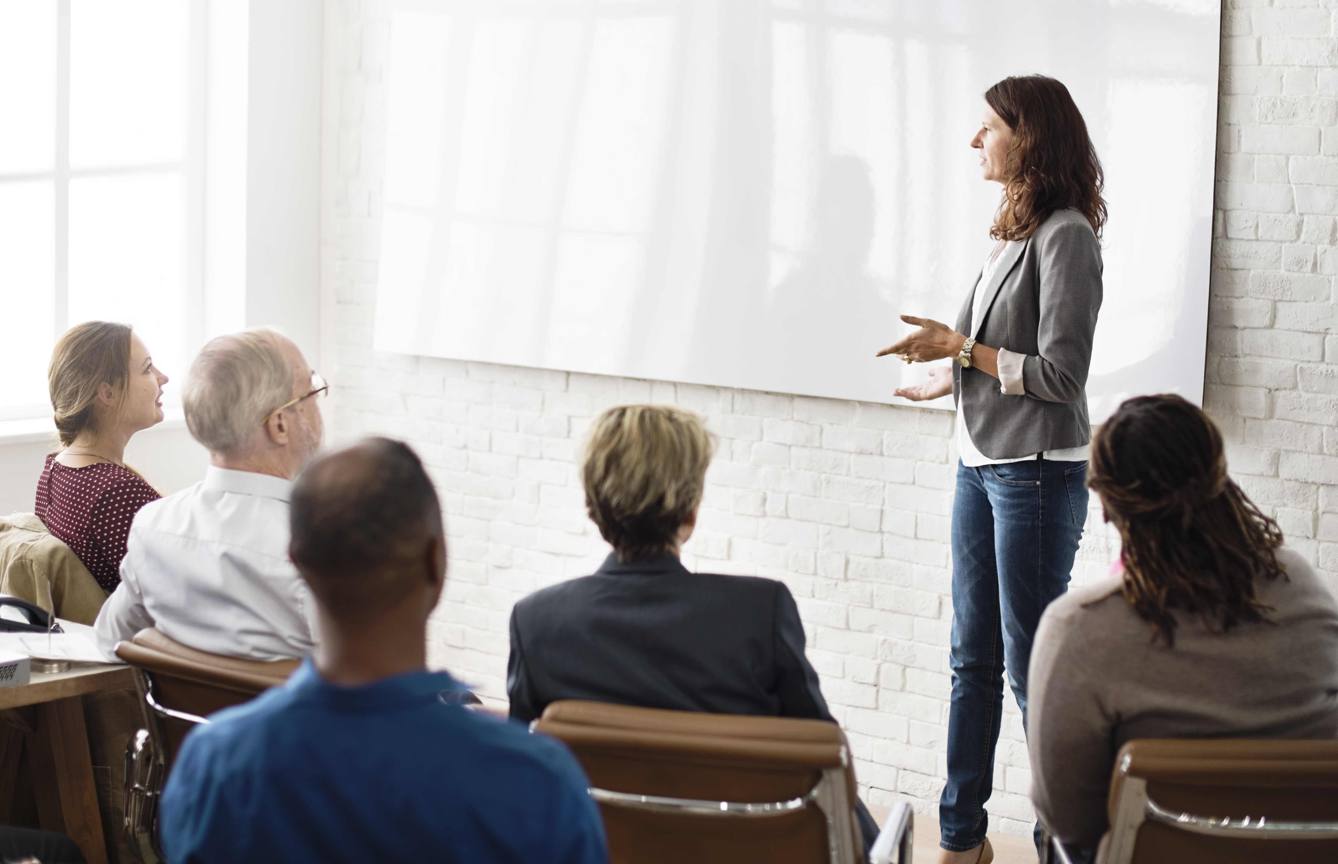 Woman Training Coworkers